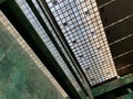 Low angle view inside minimalist interior building with green marble walls