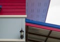 Low angle view, the joint between the garage roof and the house, metal sheet roof