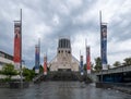 Low-angle view of Liverpool Metropolitan Cathedral's main entrance taken on a wet day