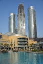 Low angle view of Luxury high rise apartment building under construction between Emaar towers in Downtown Dubai Royalty Free Stock Photo