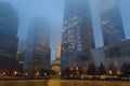 Buildings in Lower Manhattan Fading into the Fog. New York City Freedom Tower and other Skyscrapers on a Foggy Night