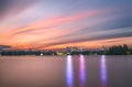 Low-angle view of modern buildings near the lake in Herastrau Park, Bucharest, Romania Royalty Free Stock Photo