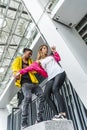 low angle view of multiethnic couple of urban dancers dancing