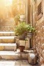Narow steep staircase alley in small mediterranean village Royalty Free Stock Photo
