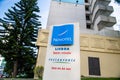 Low angle view of Novotel Lisboa Bem-Vindo welcome sign and Restaurant time