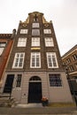 Low angle view of an old house under a cloudy sky in Dordrecht in The Netherlands Royalty Free Stock Photo