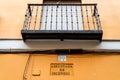 Low angle view of old iron balcony of old residential building in Madrid