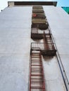 Low Angle View of Old Rusty Fire Exit Stairs