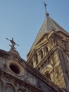 Low angle view of the one front tower of the Roman St. Joseph's Catholic Cathedral in Stone Town, Zanzibar.