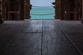 Low angle view of open door from inside the Sanctuary of Truth looking out to the ocean in Pattaya, Thailand Royalty Free Stock Photo