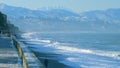 Pebble beach, surf. City embankment illuminated by lanterns. Kobuleti, Adjara, Georgia. Royalty Free Stock Photo