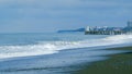 Pebble beach, surf. City embankment illuminated by lanterns. Kobuleti, Adjara, Georgia. Royalty Free Stock Photo