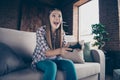 Low angle view photo portrait of cheerful ecstatic excited enthusiastic she her hipster teen girl using holding