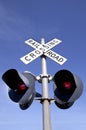 Low angle view of railroad crossing signal Royalty Free Stock Photo