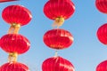 Low angle view red lanterns string hanging decoration at Asian temple in Houston, Texas, USA Royalty Free Stock Photo