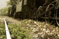 Low angle view of a retro train and railroad tracks Royalty Free Stock Photo