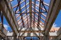 Low angle view of roof trusses and framing wooden of new house c Royalty Free Stock Photo