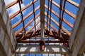 Low angle view of roof trusses and framing wooden of new house c Royalty Free Stock Photo