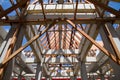 Low angle view of roof trusses and framing wooden of new house c Royalty Free Stock Photo