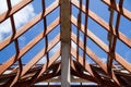 Low angle view of roof trusses and framing wooden of new house c Royalty Free Stock Photo