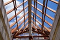 Low angle view of roof trusses and framing wooden of new house c Royalty Free Stock Photo