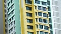 low angle view of signapore residential buildings against blue sky