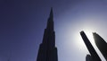 A low angle view of the skyscrapers in the centre of Dubai. Action. Concept of modern architecture. Royalty Free Stock Photo