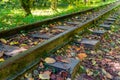 Low angle view of small railway tracks in mountain region with shallow depth of field Royalty Free Stock Photo