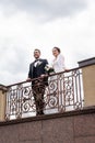 Low angle view of smiling newlyweds