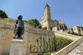 The statue of DÃ¢â¬â¢Artagnan in front of the monumental staircase leading to the Tower of Armagnac in Auch Royalty Free Stock Photo