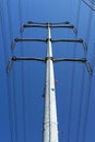 Low-angle view of steel support of overhead power transmission line Royalty Free Stock Photo