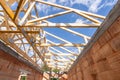 Low angle view of support roof beams and ceilings in new building Royalty Free Stock Photo