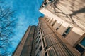 Low angle view of tall residential skyscraper building built in brutalist architectural style in 1980s in former Yugoslavia