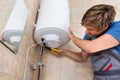 Technician Repairing Electric Boiler Royalty Free Stock Photo