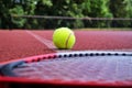 Low angle view tennis scene with ball and racquet Royalty Free Stock Photo