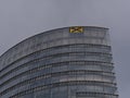 Low angle view of the top of the headquarter of bank Raiffeisen Bankengruppe in Vienna, Austria in a modern office building.