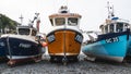 Low angle view of traditional Cornish fishing boats on the beach at Cadgwith Royalty Free Stock Photo