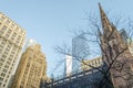 Low Angle View of Trinity Church Top and Other Skyscrapers in Wall Street, Financial District, Manhattan, New York City Royalty Free Stock Photo