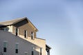 Low angle view of a two-storey house building against the clear blue sky Royalty Free Stock Photo