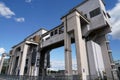 Low angle view on upper part construction of river locks with open gate.