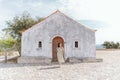 Low-angle of a white building and a female near scenic spot Miradouro das Portas de Rodao Portugal