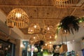 Low angle of wicker lamps and ceiling inside the building