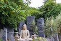 Low angle wide shot of a buddha statue in meditation pose. Buddhism concept