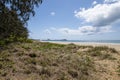 Down Low Of Natural Beach With Industry In Background Royalty Free Stock Photo