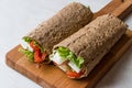Low Calorie Diet Wrap with Cheese, Tomatoes and Salad. Royalty Free Stock Photo