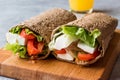 Low Calorie Diet Wrap with Cheese, Tomatoes, Salad and Orange Juice. Royalty Free Stock Photo