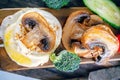 Low-calorie English Breakfast eggs Benedictine with fried mushrooms and broccoli Royalty Free Stock Photo