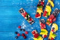 Low calorie summer sandwiches with creamy cheese and berry fruits top view. Easy snack for breakfast or lunch Royalty Free Stock Photo