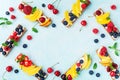 Low calorie summer sandwiches with creamy cheese and berry fruits top view. Easy snack for breakfast or lunch Royalty Free Stock Photo