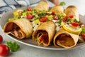 Low-Carb Keto Pizza Taquitos with Sugar-Free Pizza Sauce and Low-Carb Tortillas